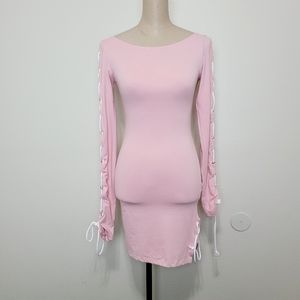 Nadia Aboulhosn tied up pink dress S